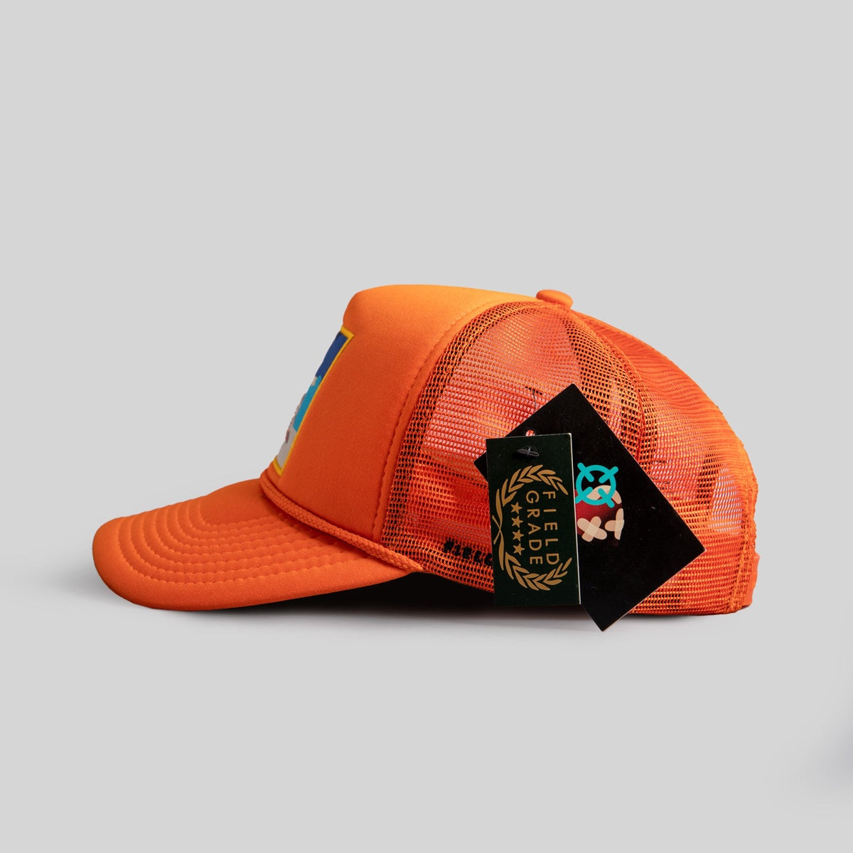 FIELD GRADE X KURVE STUDIO HEAVY IS the HEAD ORANGE TRUCKER