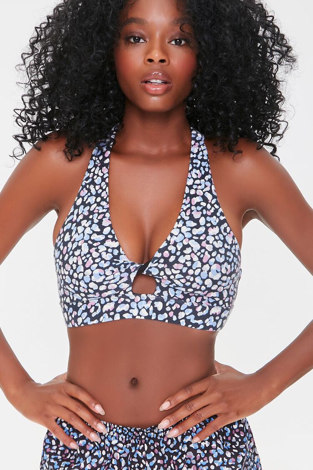 MyRunway  Shop Forever 21 Multi Spotted Print Twisted Sports Bra