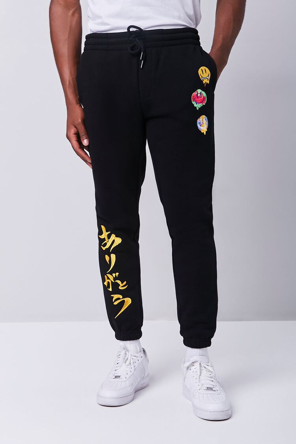 BLACK/MULTI Smiling Face Embroidered Graphic Joggers, image 1